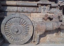 Indian sculpture showing a chariot wheel 